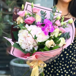 Bouquet of pink hydrangea, roses, eucalyptus, decorative greenery