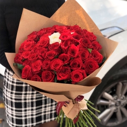50 Red Roses and 1 White Rose